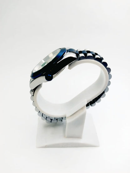 Rolex Silver Arabic Dial Watch – Blue Accents