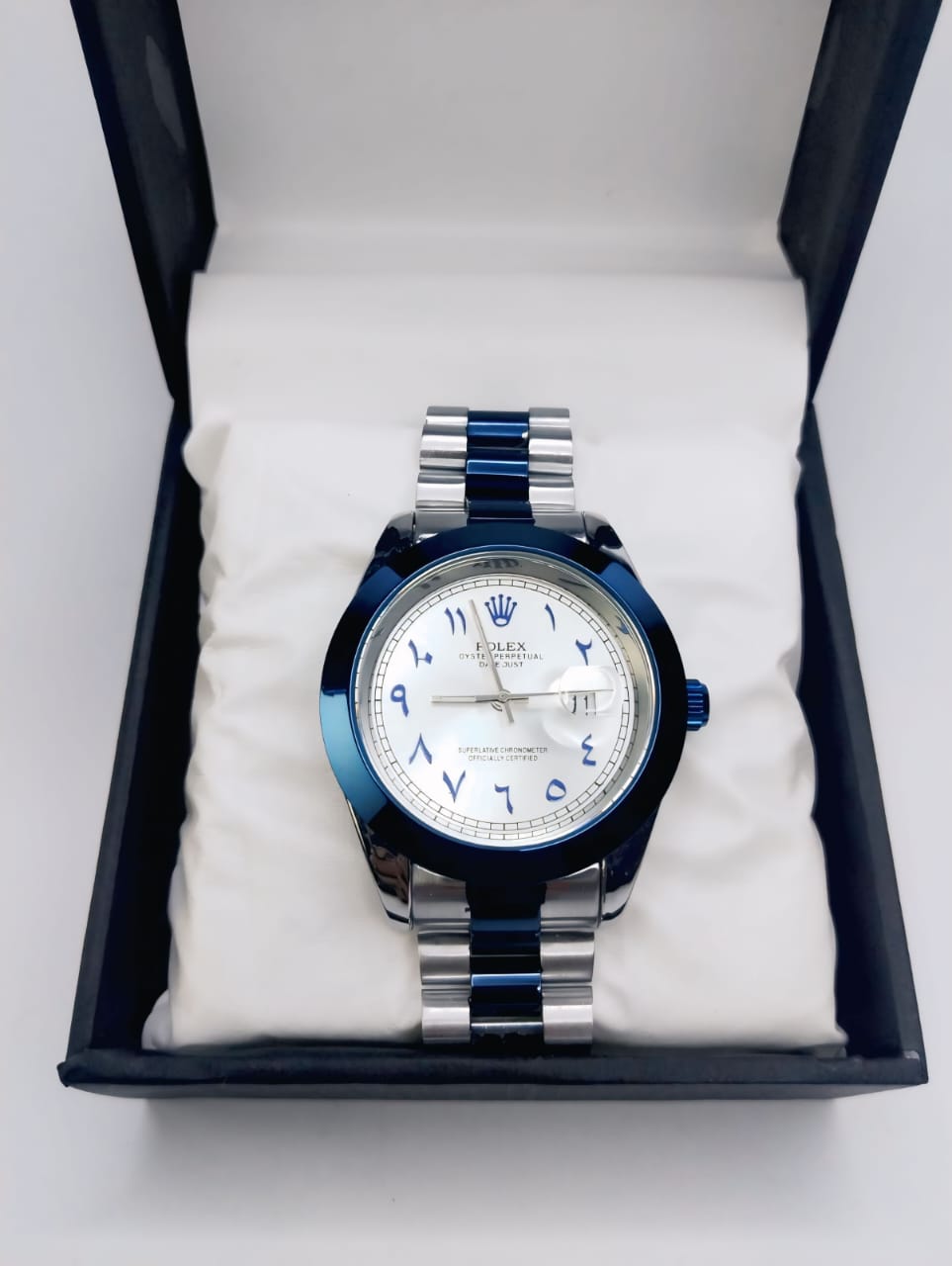 Rolex Silver Arabic Dial Watch – Blue Accents